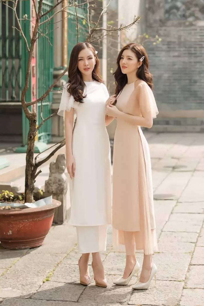 Áo dài tay phồng giúp che khuyết điểm bắp tay