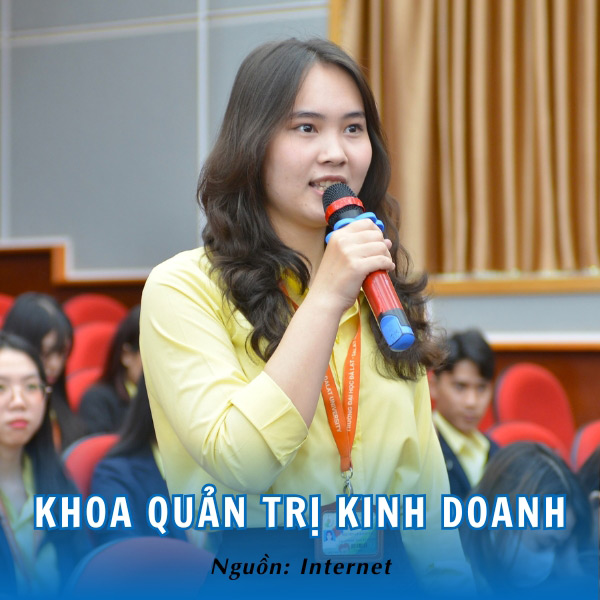 Mẫu áo sơ mi vàng đồng phục khoa quản trị kinh doanh 