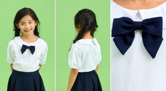 Mẫu đồng phục nữ tiểu học thiết kế cổ sen, tay áo bồng