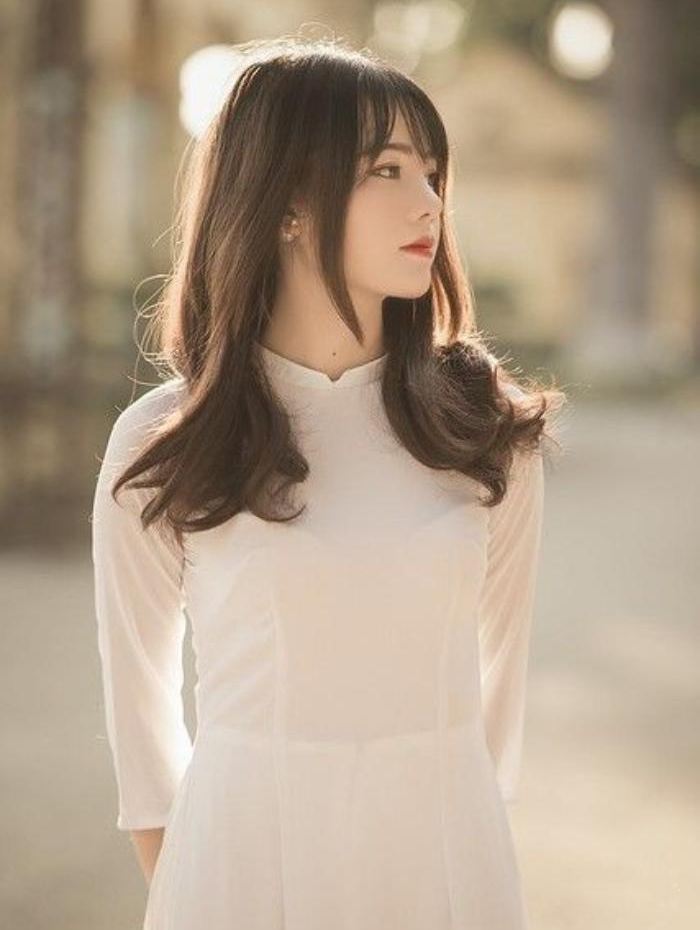 Mẫu tóc layer dài uốn đuôi