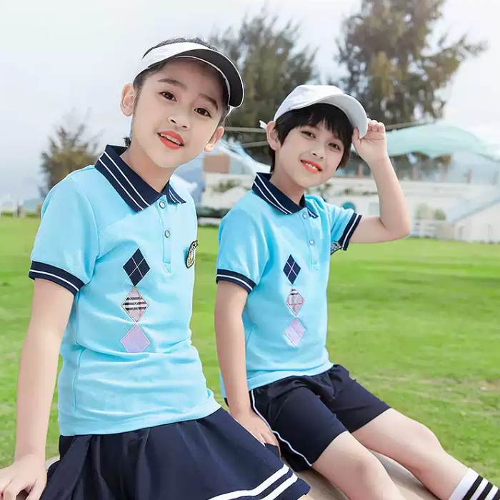 Áo polo đồng phục học sinh tiểu học màu xanh ngọc