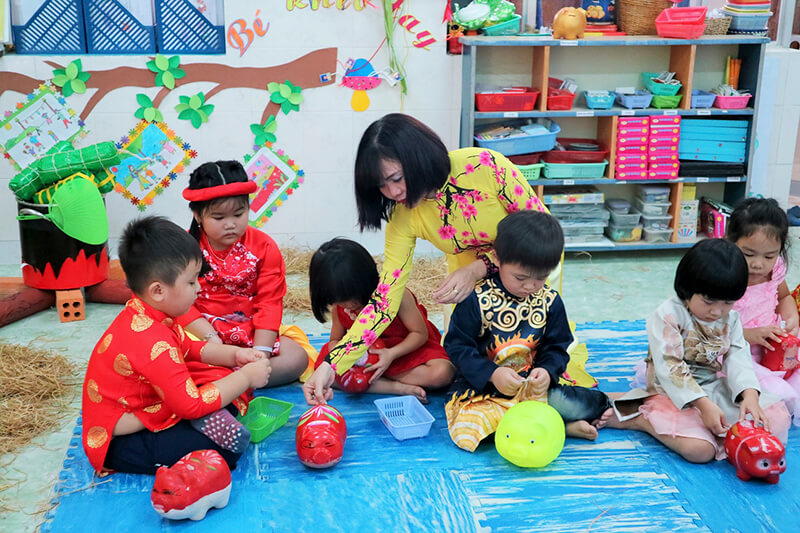 Mẫu áo lớp Colormix màu cam tươi + đen 12A1